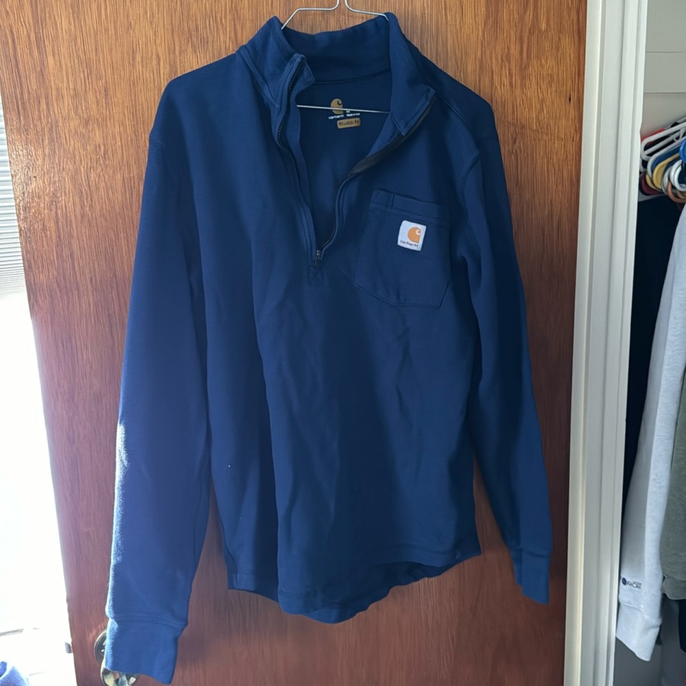 Carhartt medium relaxed fit quarter zip with pocket. Navy